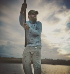Captain Andrew Mizell Pushing Skiff - Jacksonville Marsh Looking for redfish - Fly Fishing